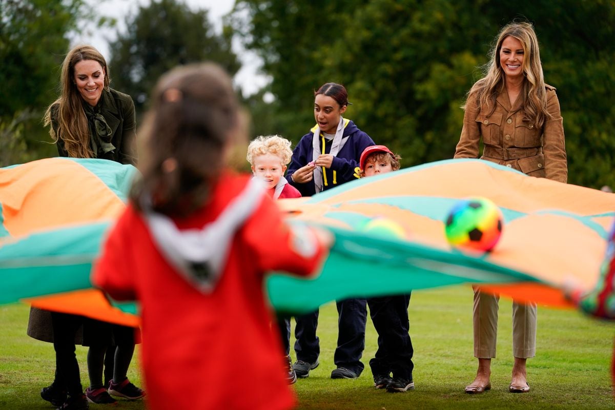 WINDSOR, ENGLAND - SEPTEMBER 18: U.S. First Lady Melania Trump (R) and Catherine, Princess of Wales meet members of the Scouts' Squirrels programme in the grounds of Frogmore Cottage, during the State visit by the President of the United States of America and U.S. First Lady Melania Trump, on September 18, 2025 in Windsor, England. (Photo by Nathan Howard - WPA Pool/Getty Images)