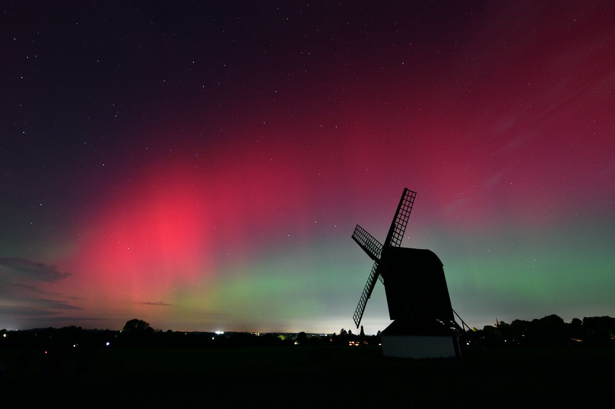 The Aurora Borealis lights up the night sky over Pitstone Windmill in Buckinghamshire.