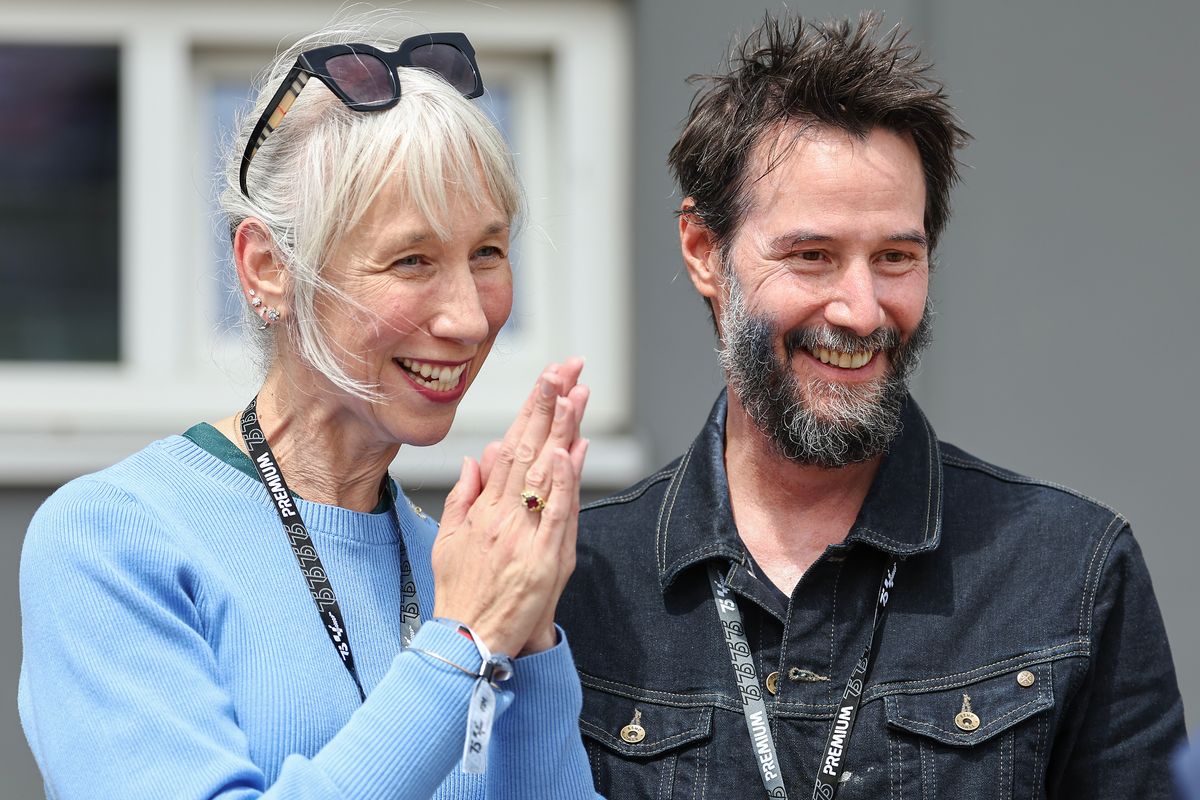 Keanu Reeves and Alexandra Grant during the MotoGP of Germany at Sachsenring Circuit on July 7, 2024 