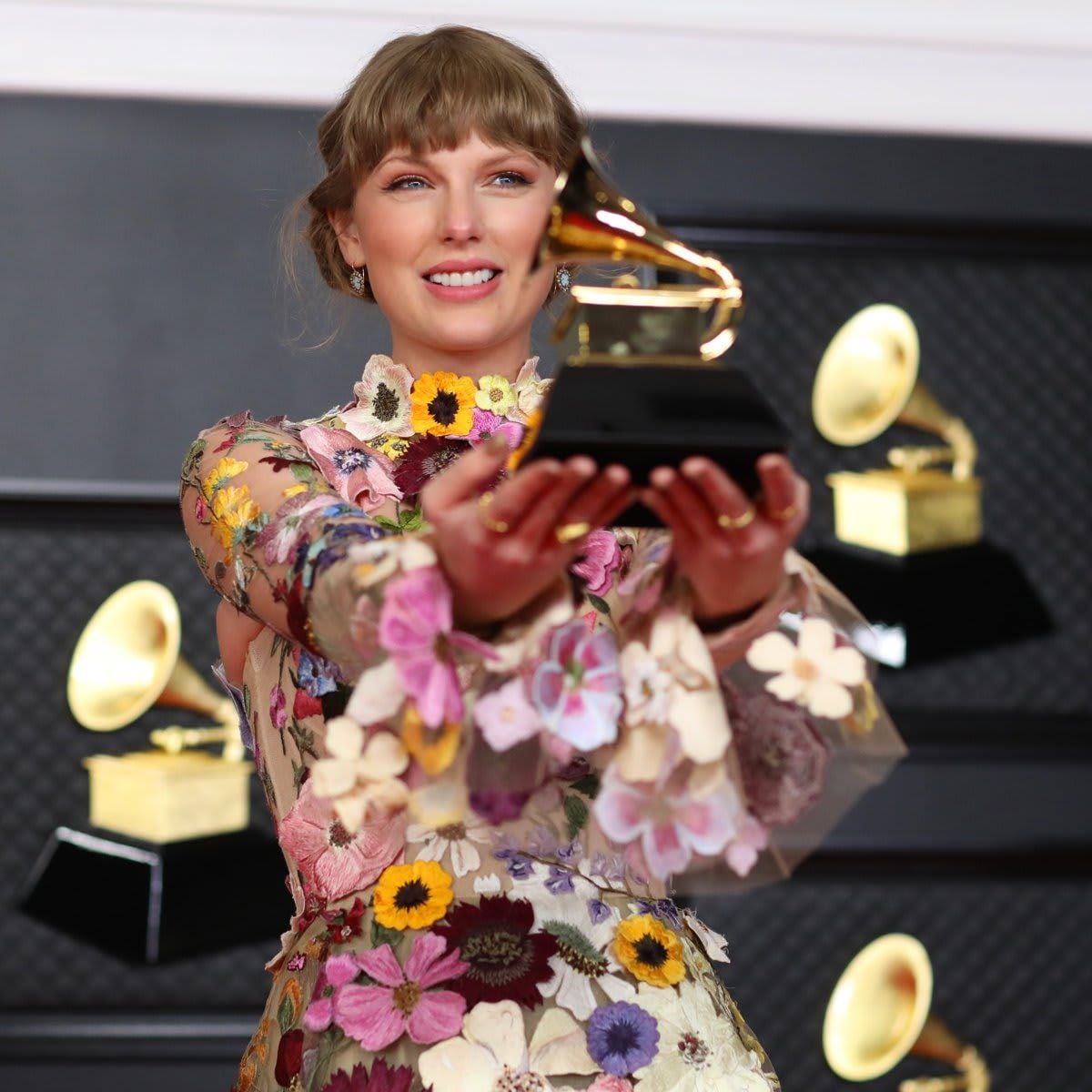 Musical talent pose on the red carpet at the 63rd Annual Grammy Awards show in downtown Los Angeles