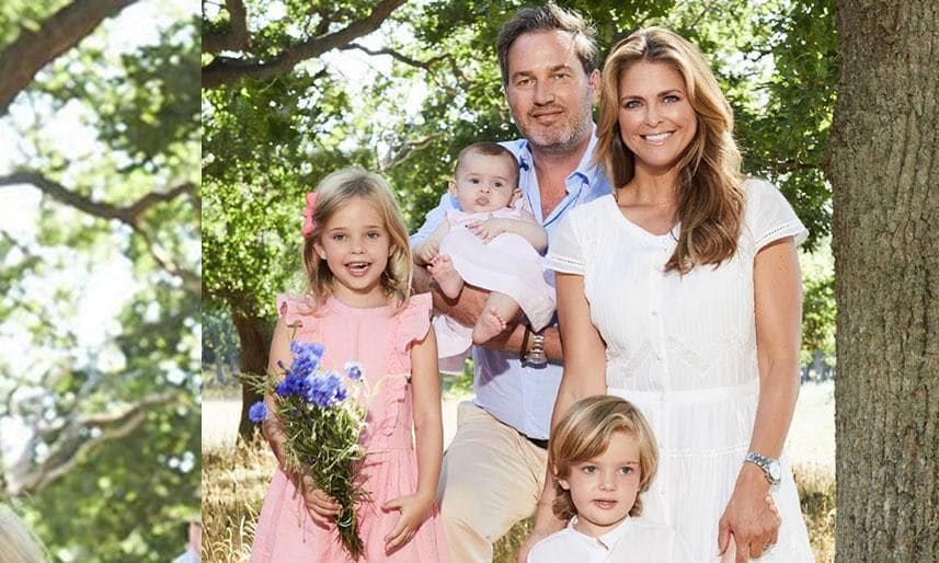 Princess Madeleine of Sweden posing with husband and three children