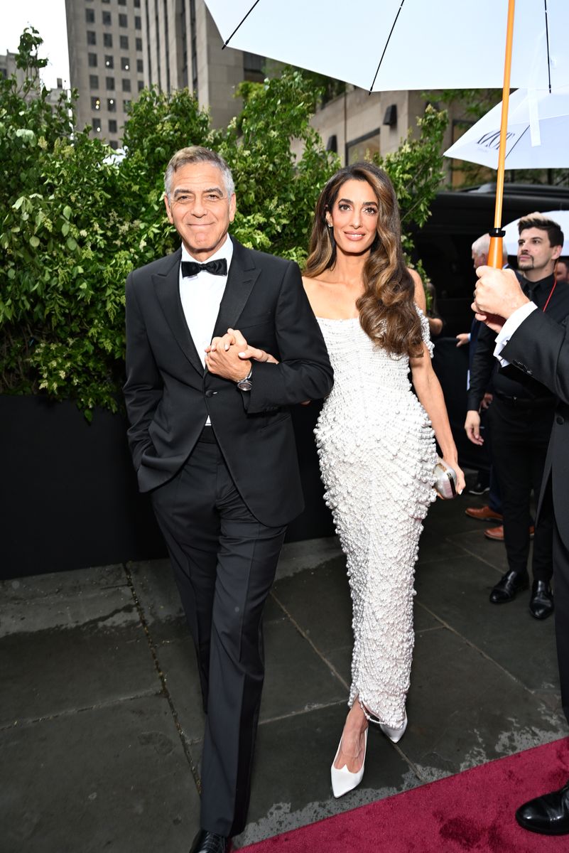 Amal Clooney turns heads in tight-high slit dress during special night out with George Clooney