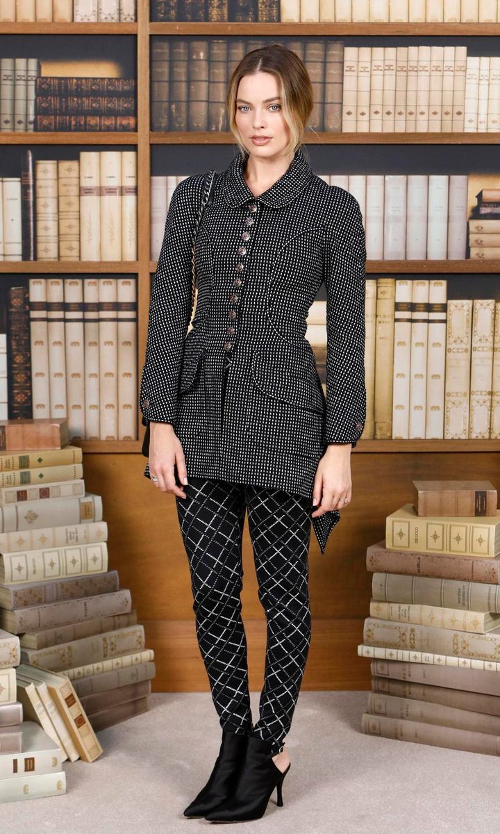 The combinations of different check designs adds a twist to her outfits.