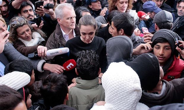 Angelina Jolie was greeted by hundreds of migrant refugees at a Greek port.
<br>
Photo: Getty Images