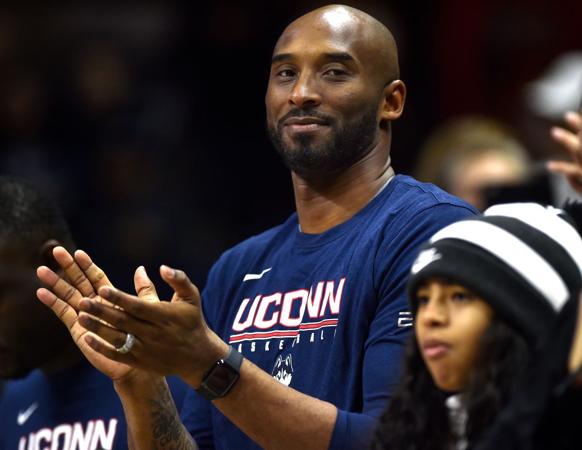 Kobe and Gigi Bryant applauds the UConn seniors on Senior Day at Gampel Pavilion Saturday.  UConn beat Houston 83-61. 