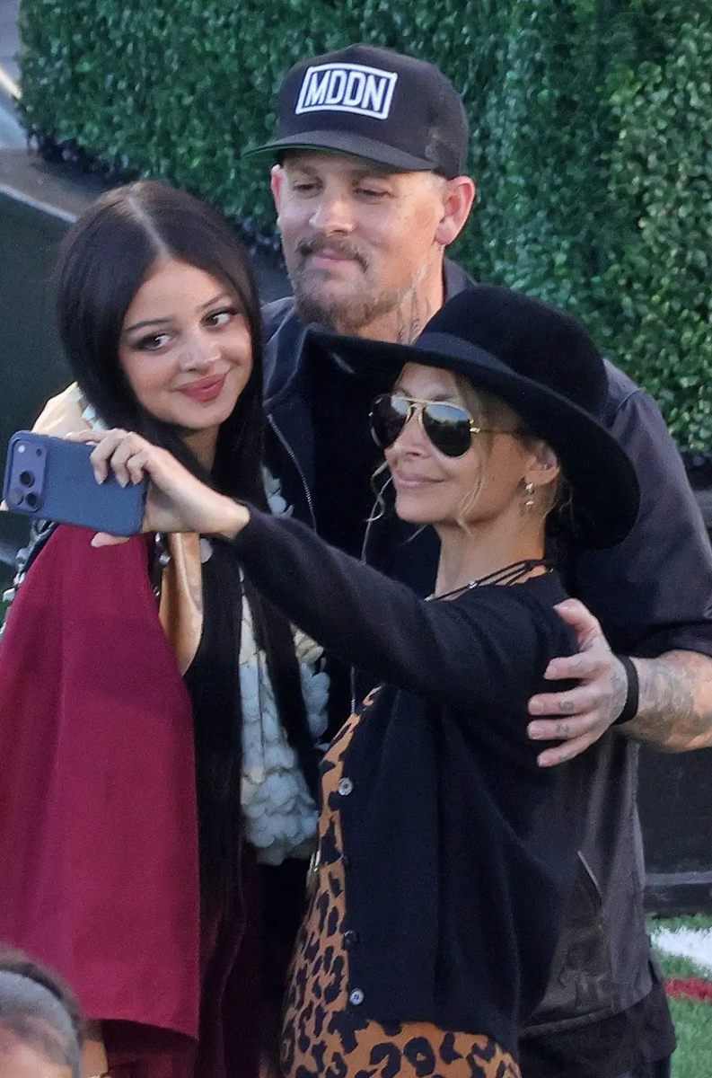 Nicole Richie and Joel Madden are celebrating a huge family milestone. The proud parents were spotted attending their daughter Kate Madden's high school graduation on Wednesday, June 3. The 18-year-old marked the special occasion in a red cap and gown, accessorized with a white lei, while wearing her long dark hair straight for the ceremony.