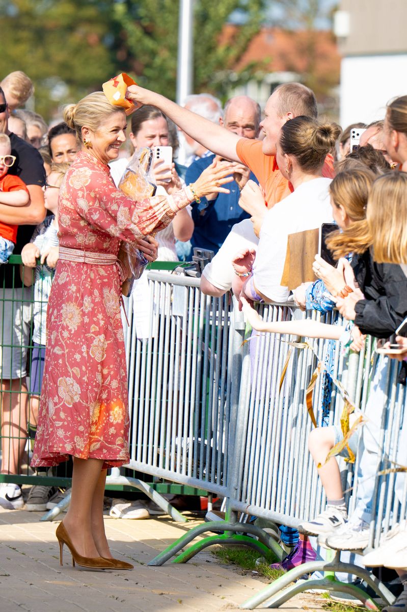 Queen Máxima shares a playful moment with well-wishers during her visit to Urk on September 30.