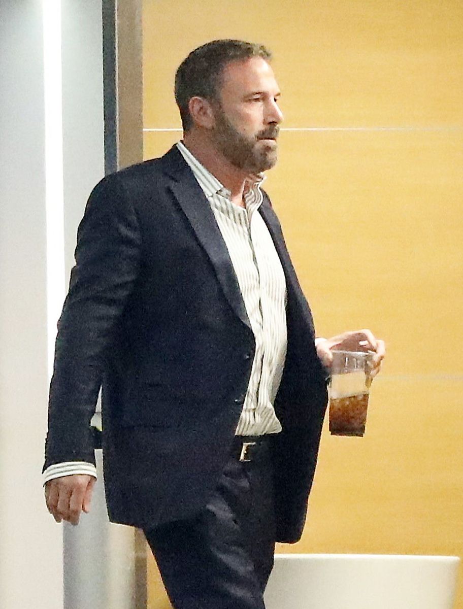 Ben was spotted arriving at his office after her passing became public