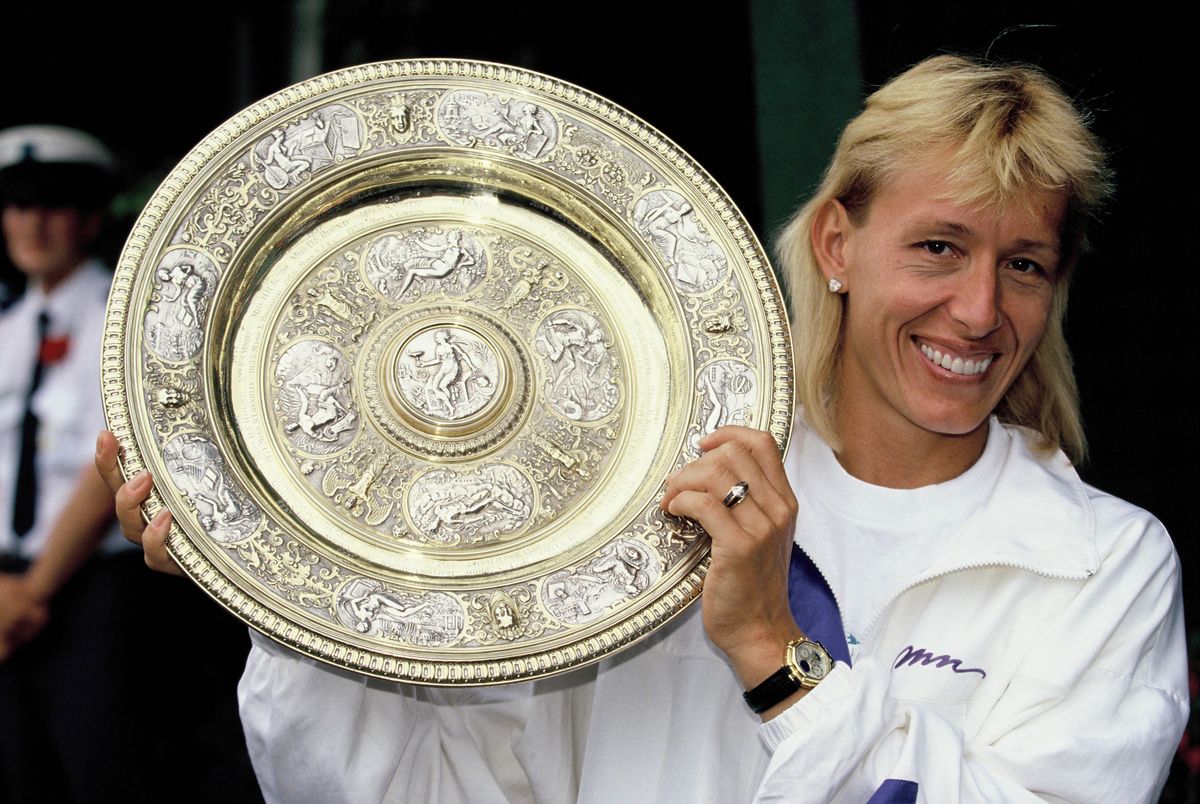 Martina Navratilova with her trophy after winning the Women's Singles at the Wimbledon Championships on July 8, 1990 in London