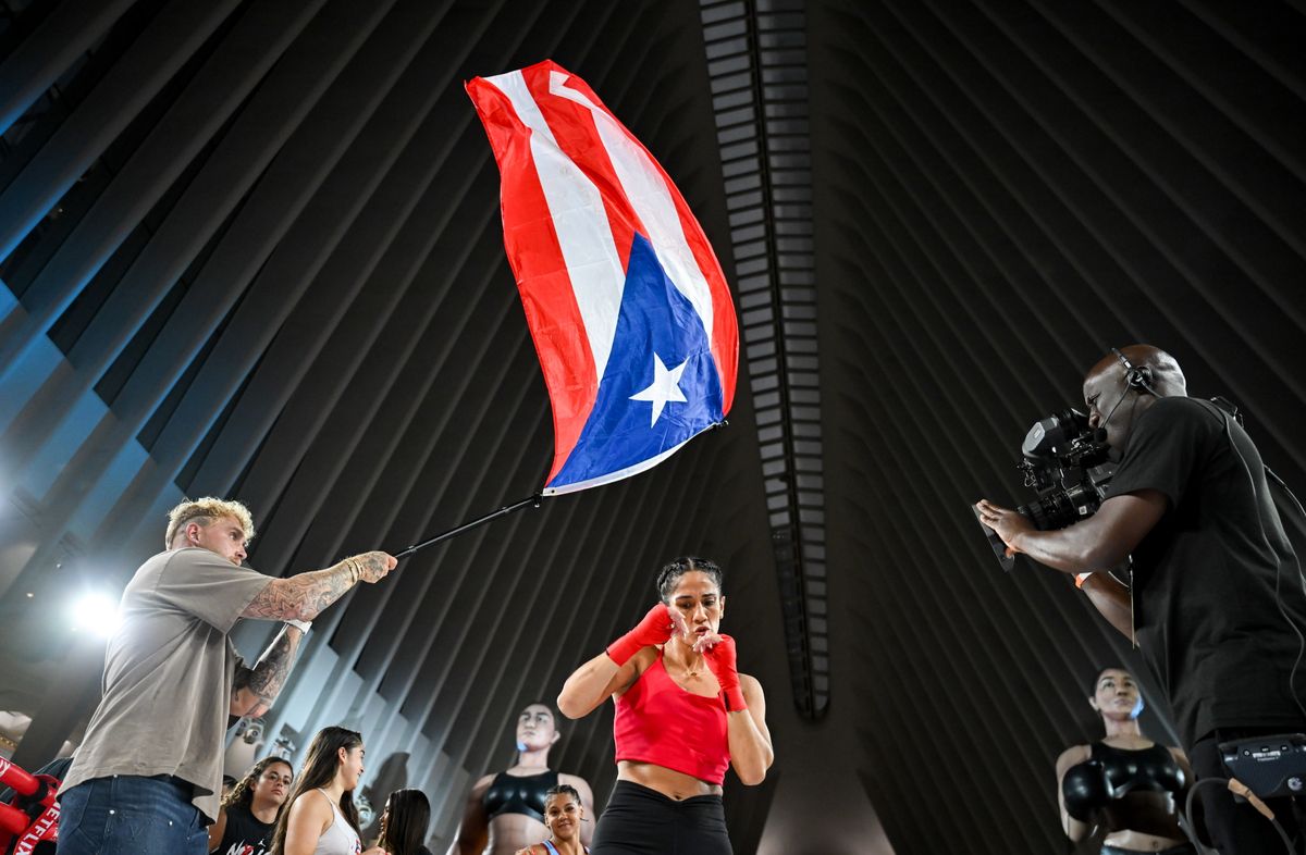 Amanda Serrano and Jake Paul, co-Founder of Most Valuable Promotions, during an open workout session, held at The Oculus at World Trade Center in New York, USA, ahead of her undisputed super lightweight championship fight with Katie Taylor, on July 11th at Madison Square Garden in New York. (Photo By Stephen McCarthy/Sportsfile via Getty Images)