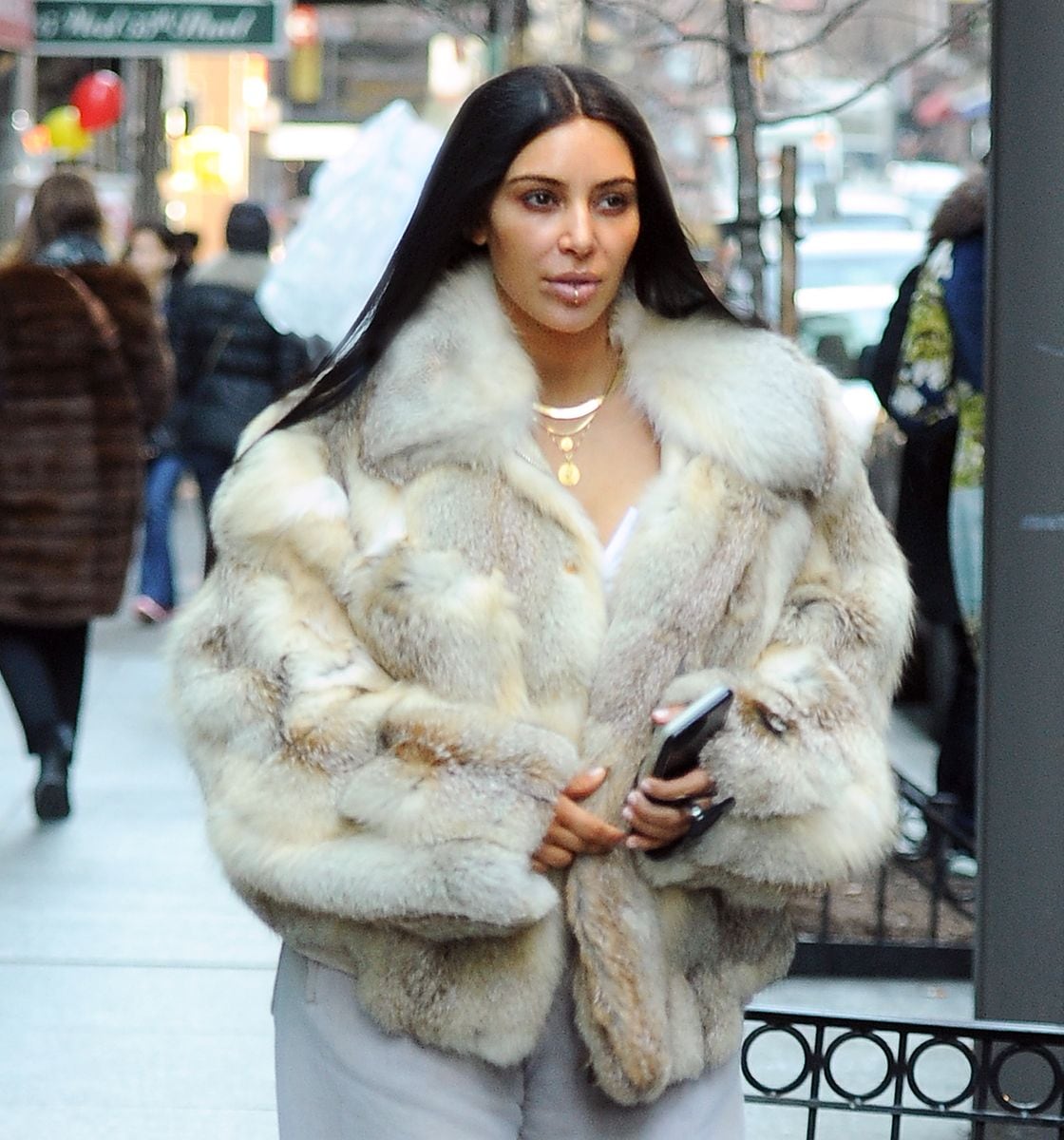 Kim Kardashian displays her lip piercing in NYC