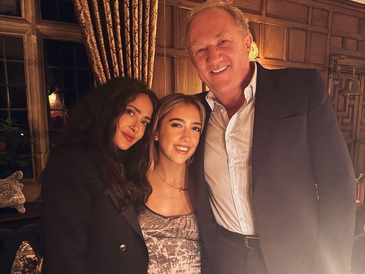 Salma posted a photo album that opened with a beautiful family portrait: Valentina, beaming in a gray patterned dress, surrounded by the love of her parents.