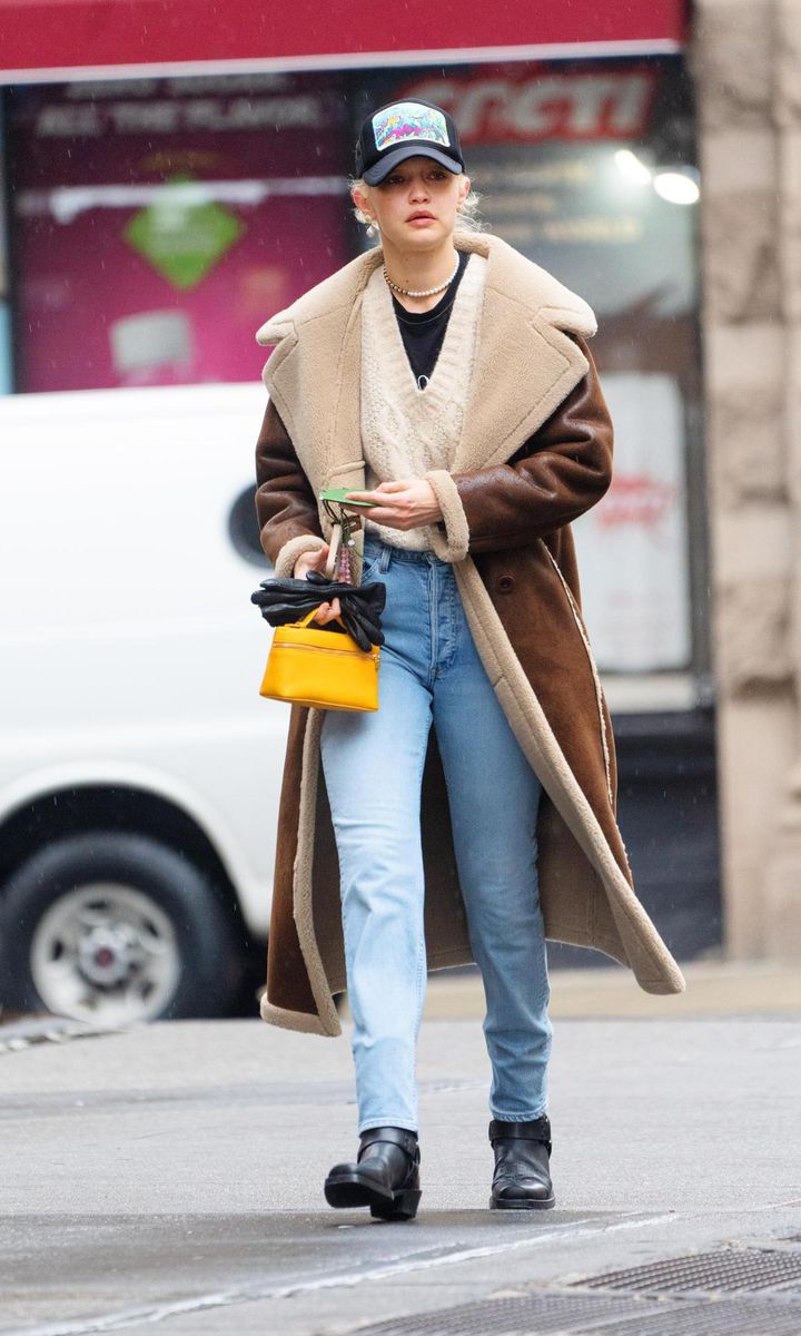 Gigi Hadid Tucks Her New Platinum Blonde Hair Under A Cap While Out In NYC