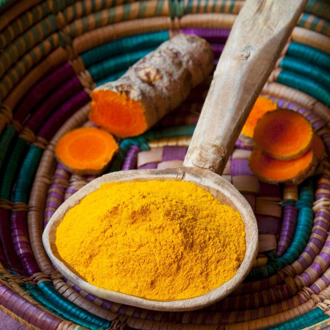 Turmeric powder and fresh turmeric roots