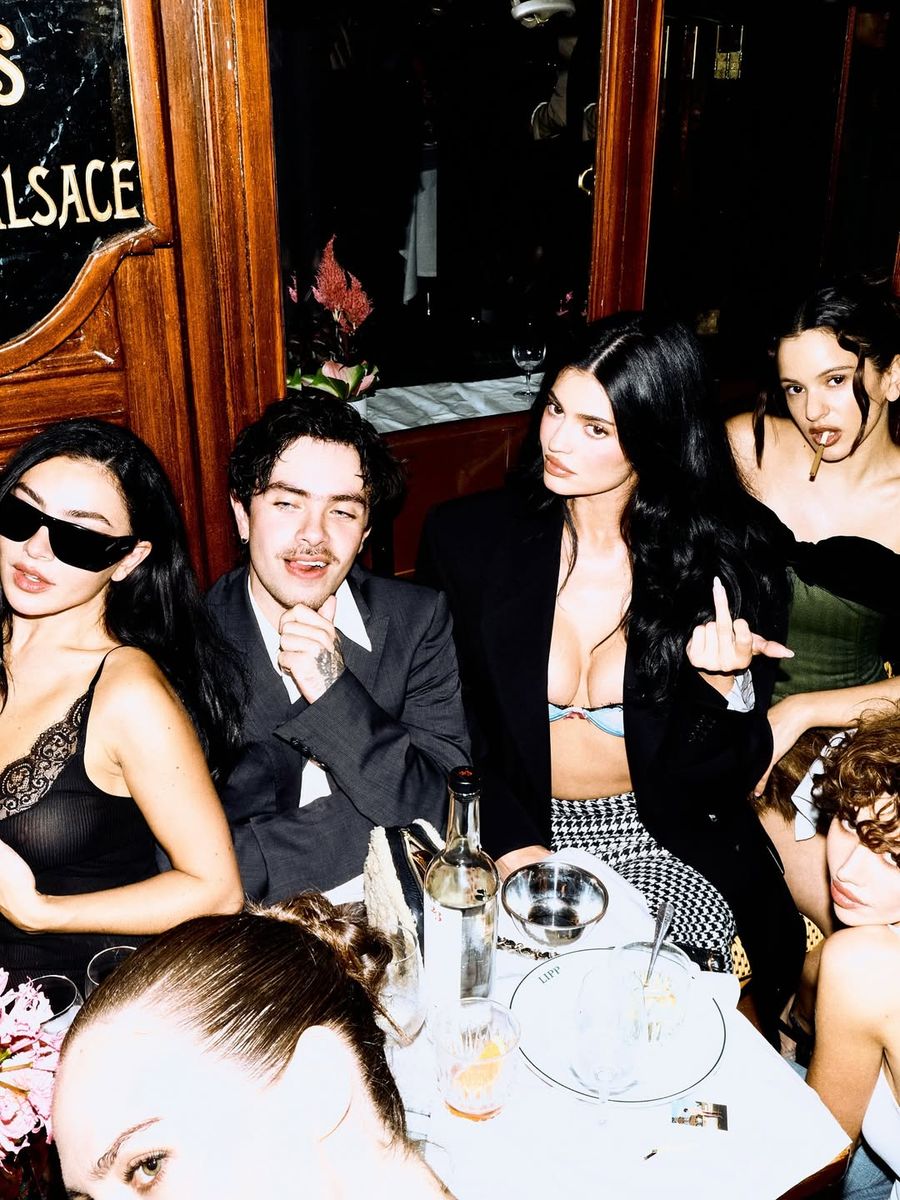 Jenner shared a photo alongside a Chalamet lookalike and other notorious people, including Rosalia and Charli XCX