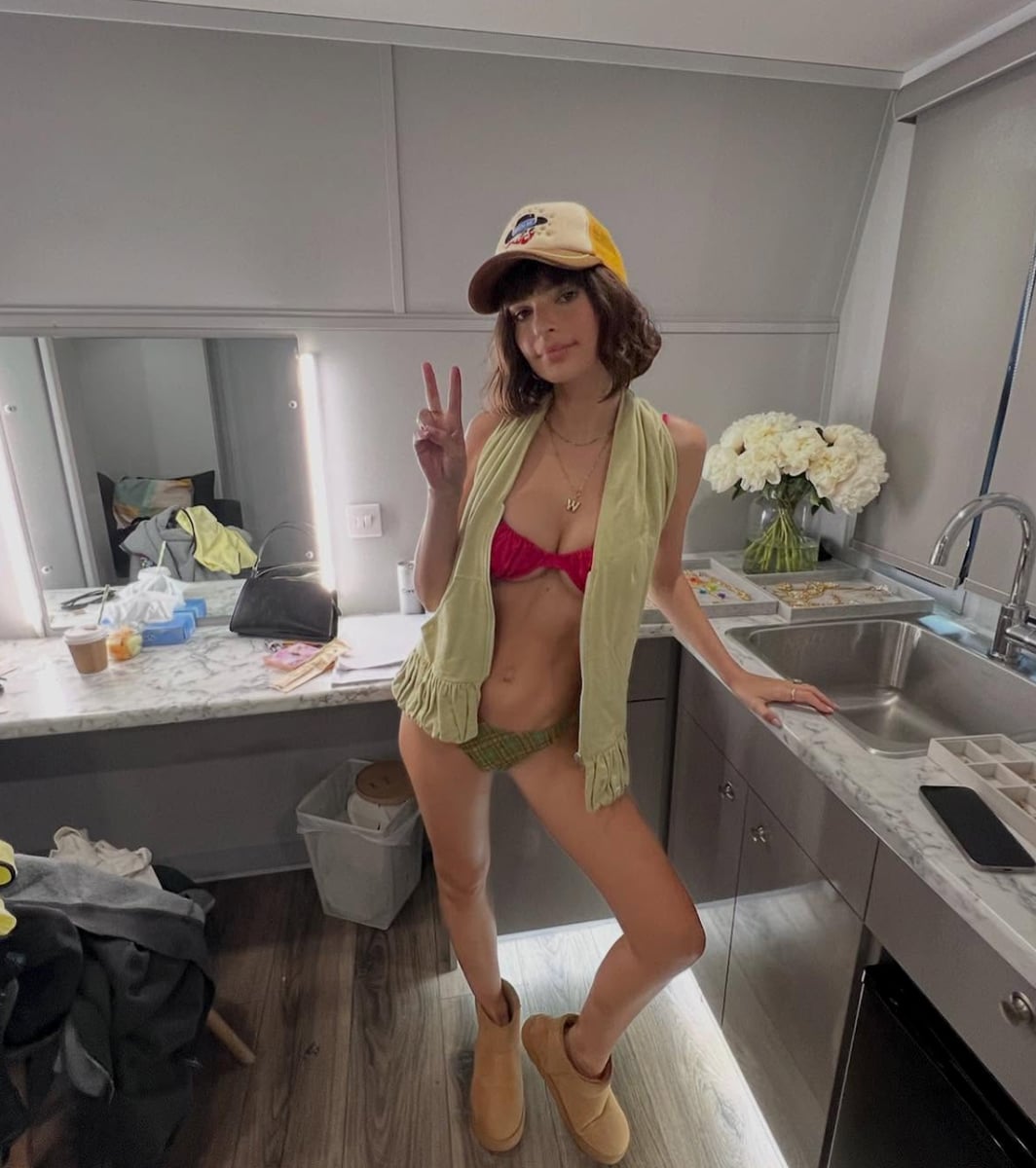 Emily Ratajkowski rocks new hairstyle in bikini and trucker hat