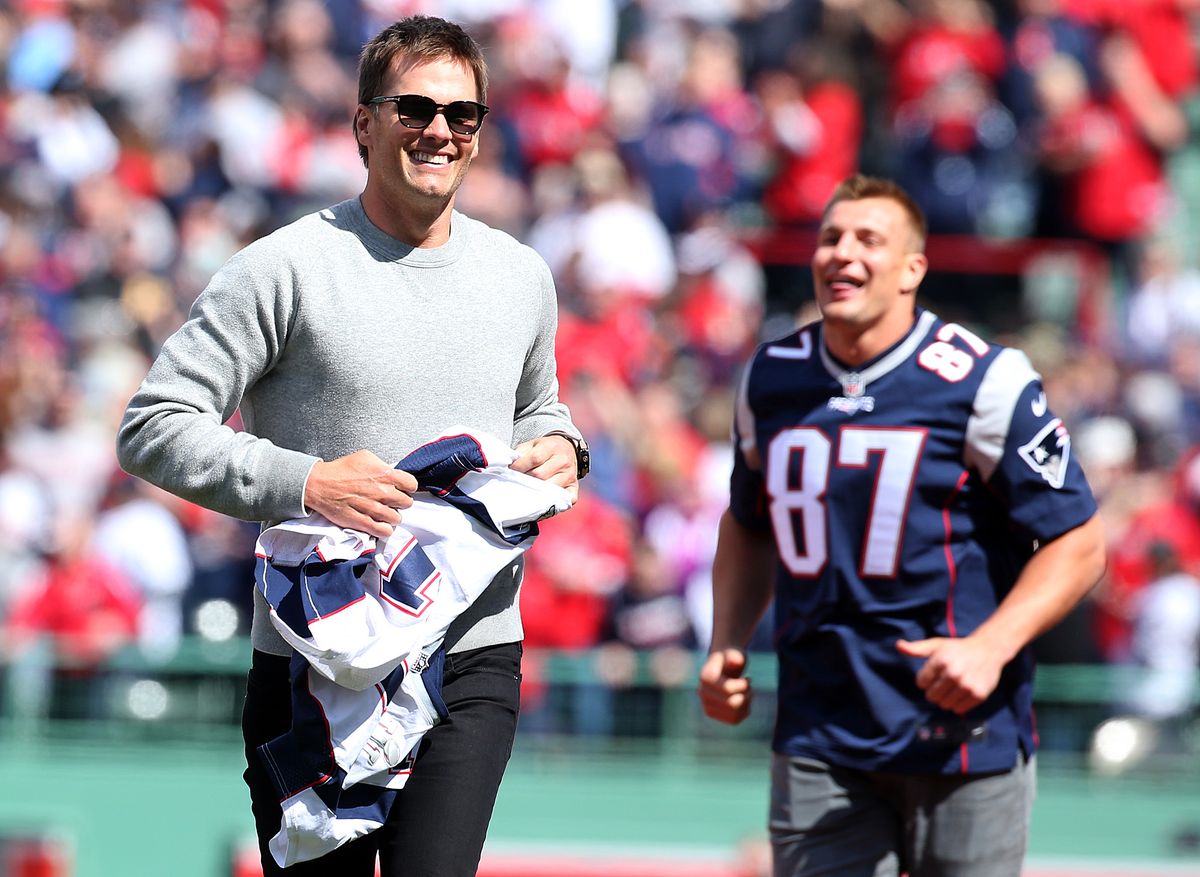 England Patriots quarterback Tom Brady shows off his returned stolen jersey , stolen again by Rob Gronkowski before the Boston Red Sox season opener against the Pittsburgh Pirates at Fenway Park in Boston on Monday, April 3, 2017. Staff Photo by Nancy Lane