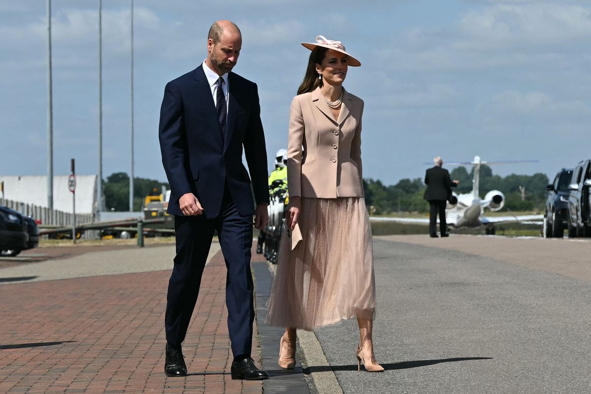 Britain's Prince William, Prince of Wales and Britain's Catherine, Princess of Wales arrive to greet France's President Emmanuel Macron and his wife Brigitte Macron, upon arrival at RAF Northolt, west of London, on July 8, 2025, on the first day of a three-day state visit to Britain. French President Emmanuel Macron began a three-day state visit to Britain on Tuesday, which will see him address parliament and try to rekindle a purportedly warm relationship with King Charles III. (Photo by JUSTIN TALLIS / POOL / AFP) (Photo by JUSTIN TALLIS/POOL/AFP via Getty Images)          