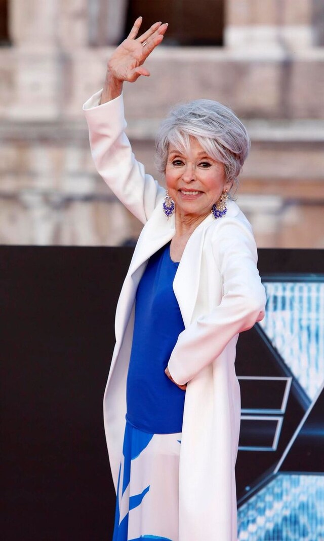 Rita Moreno celebrates 92nd birthday singing on top of a chair