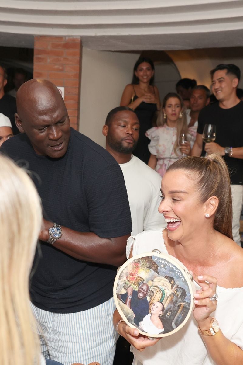 NBA legend Michael Jordan and his wife Yvette Prieto laugh and dance the night away at Anema e Core Tavern