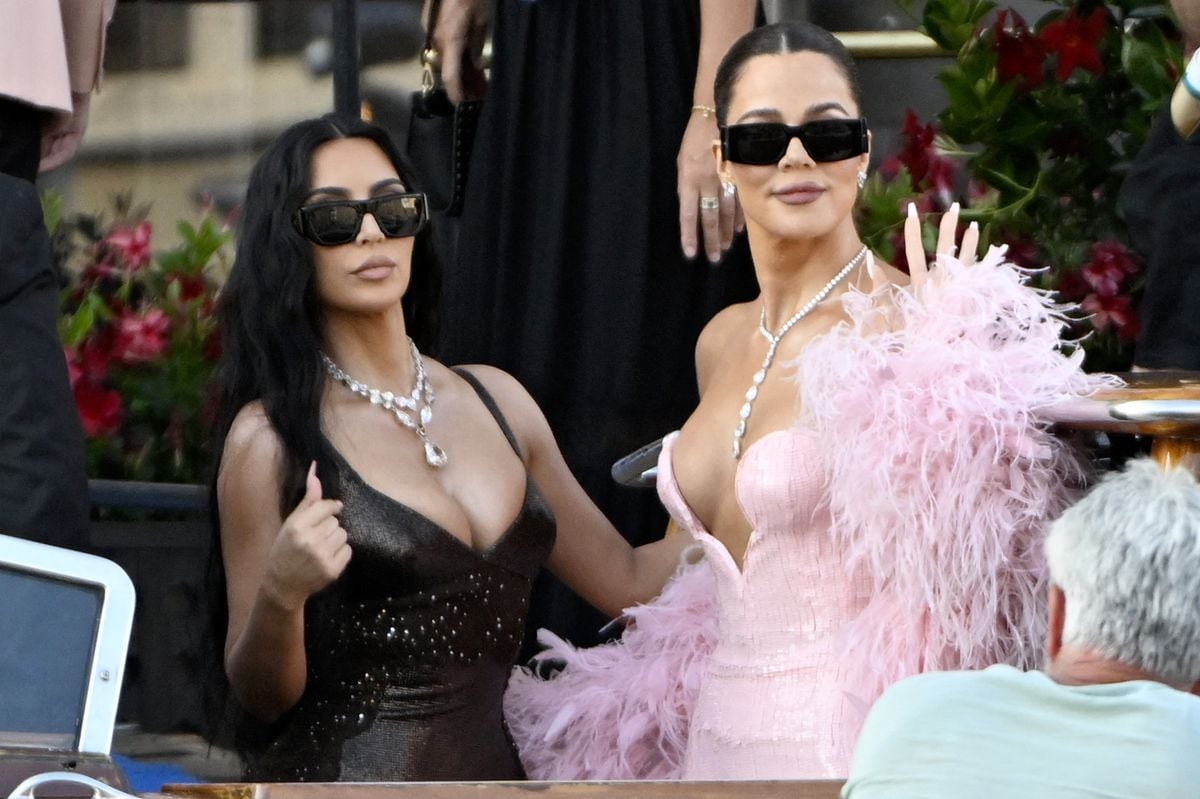 Kim and Khloe were among those in attendance for the billionaire's wedding, dressed to impress 