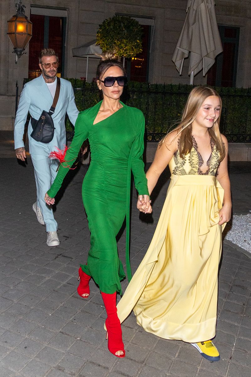 (L-R) David Beckham, Victoria Beckham, and Harper Beckham are seen in Paris, France on September 30, 2022.