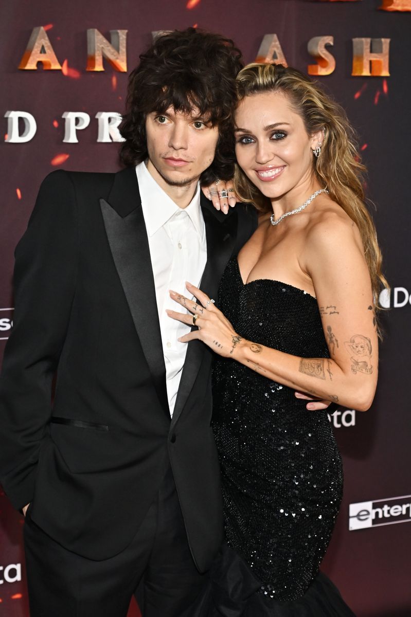 Maxx Morando and Miley Cyrus at the "Avatar: Fire and Ash" World Premiere 