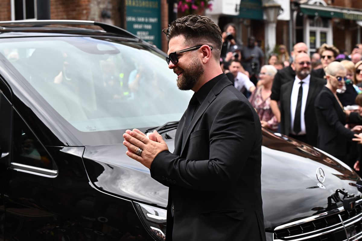 Jack Osbourne greets fans as he arrives to view tributes to the late Ozzy Osbourne 
