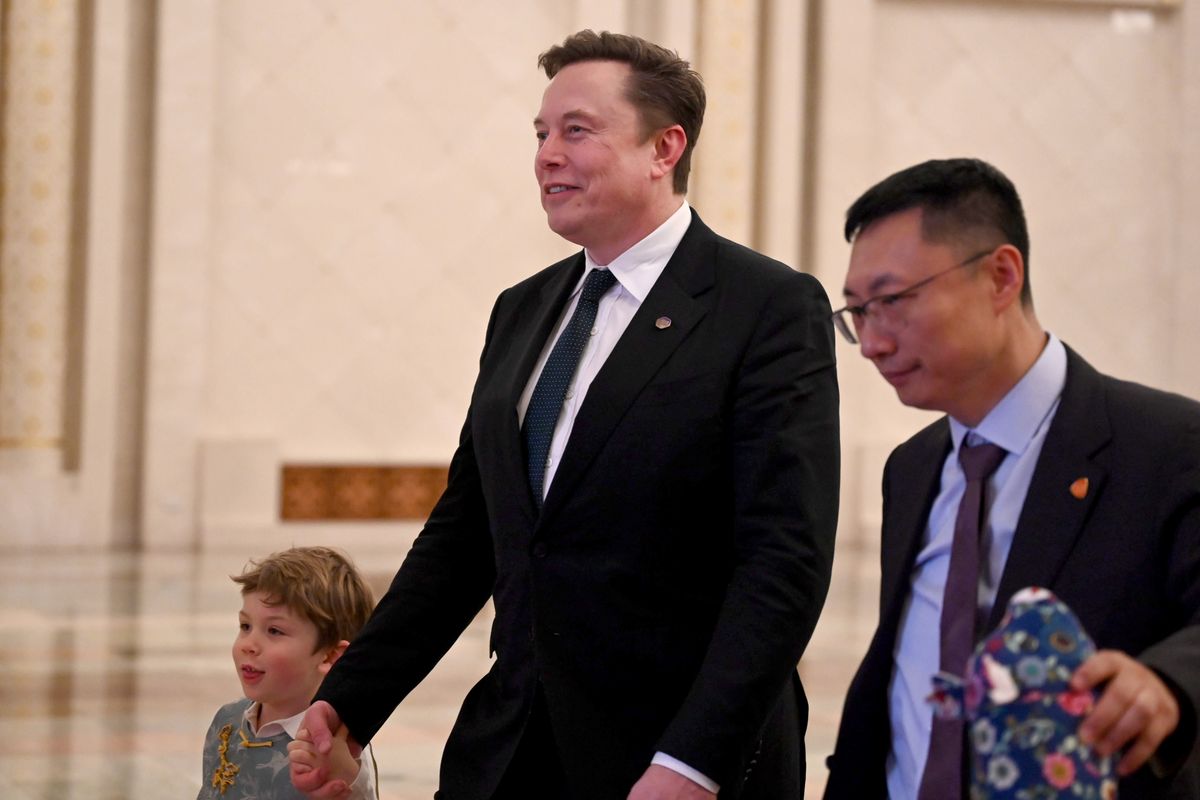 Elon Musk and his son in Beijing