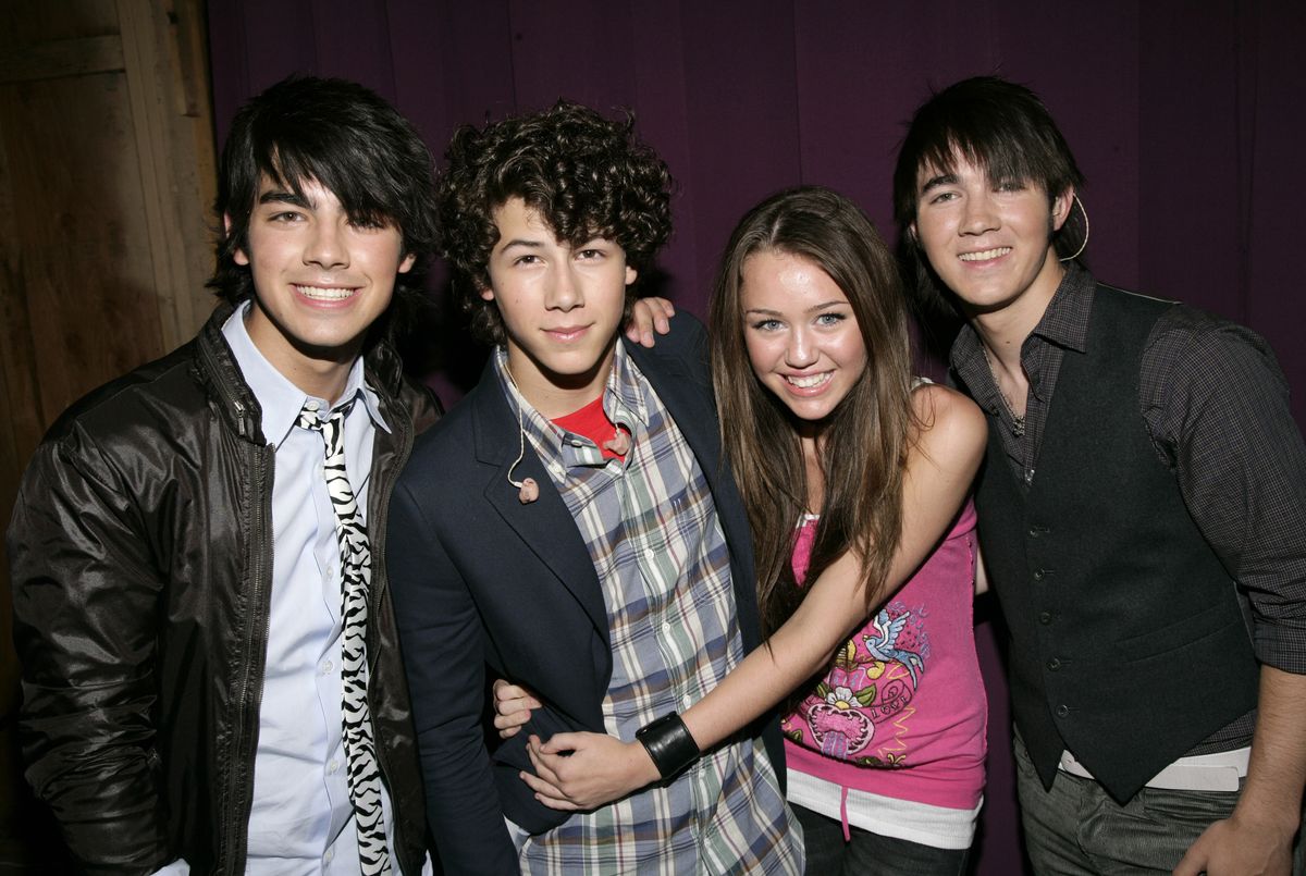 The Jonas Brothers and Miley Cyrus in 2007