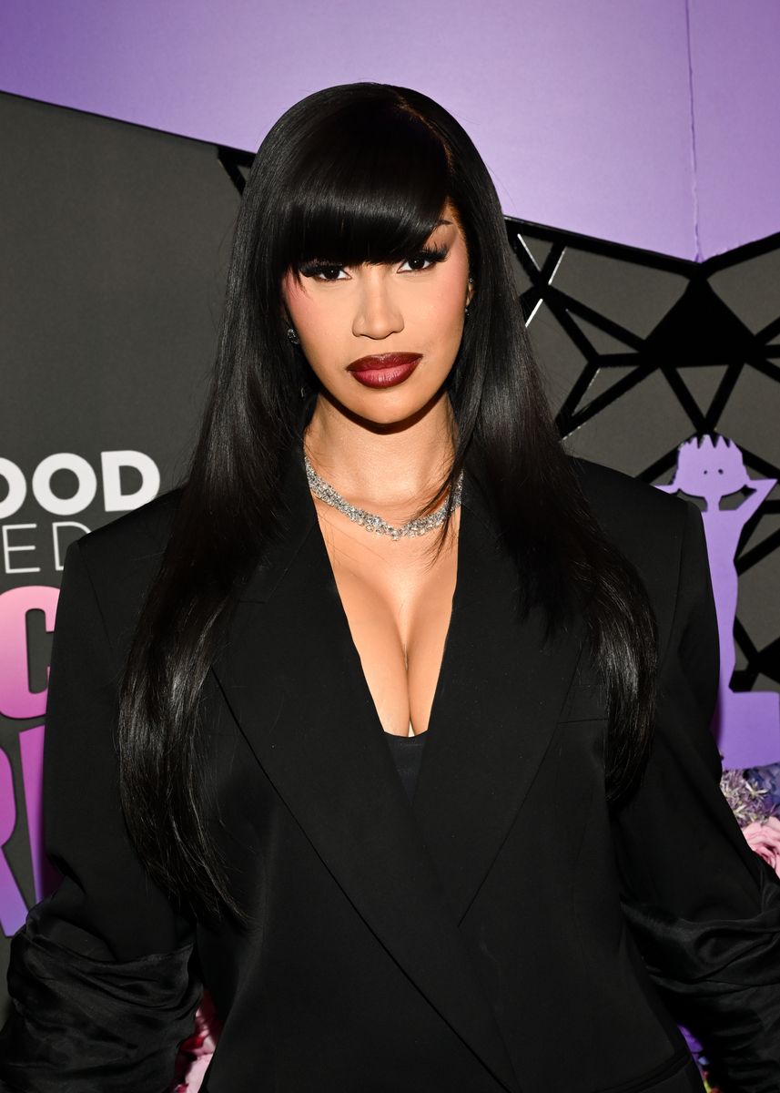 Sleek Jet-Black Layers with Side Bangs