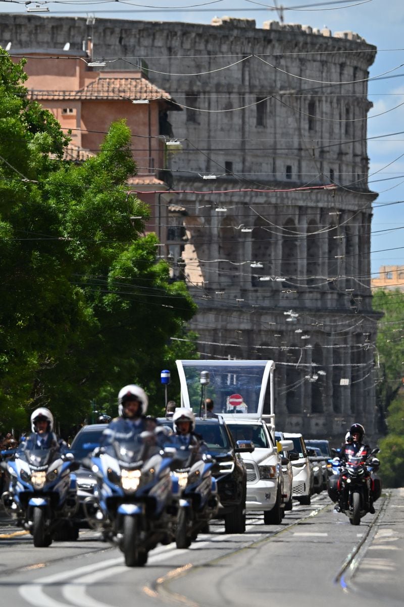 The coffin of the late Pope Francis is transported on a popemobile from St Peter's Basilica to Santa Maria Maggiore Basilica on April 26, 2025 in Rome, Italy. 