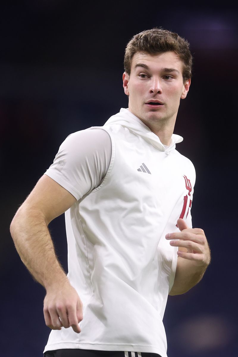 Fernando Mendoza #15 of the Indiana Hoosiers looks on before the 2025 Big Ten Football Championship against the Ohio State Buckeyes.
