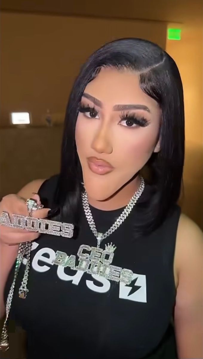 North West takes Halloween to another level with a hilarious Natalie Nunn transformation, complete with a prosthetic chin, a Baddies chain, and a reaction from the reality TV star herself.
