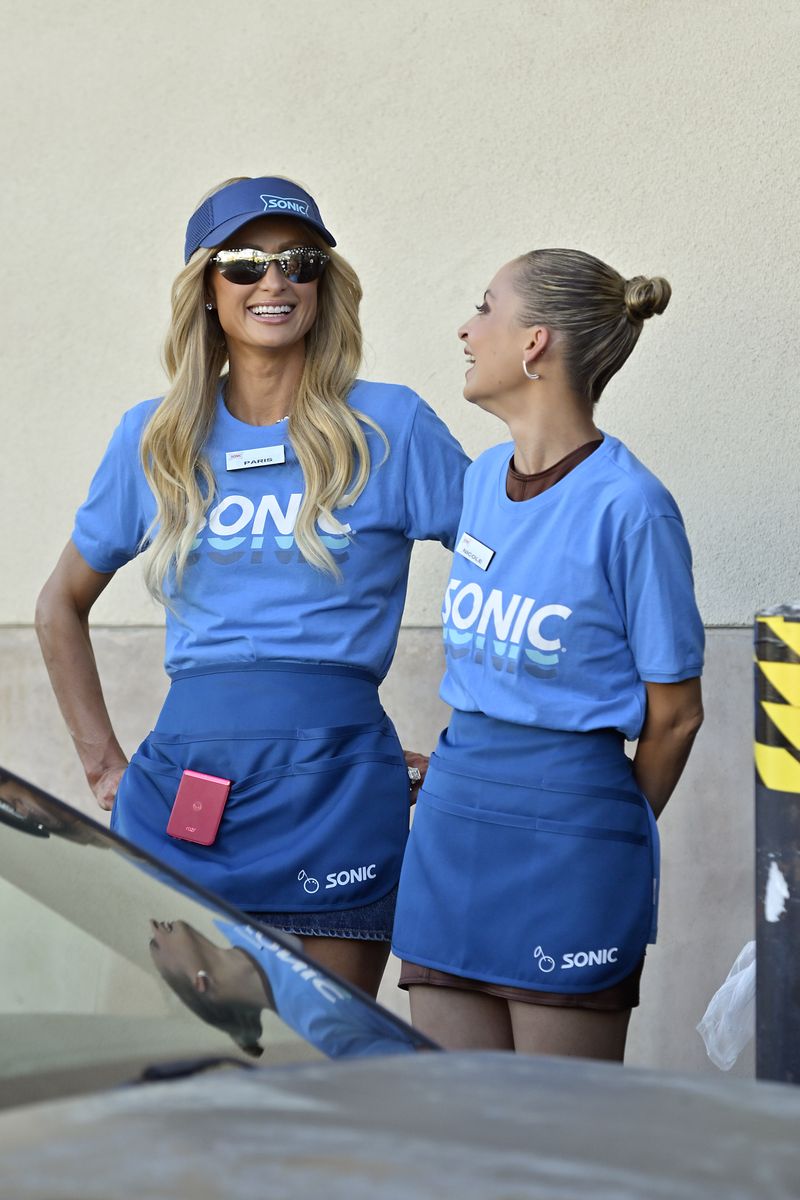 Paris Hilton and Nicole Richie work at Sonic Drive-In while filming scenes for 'The Simple Lifeâ' reboot TV show on August 05, 2024, in Duarte, California. (Photo by Sara Jaye/WireImage)