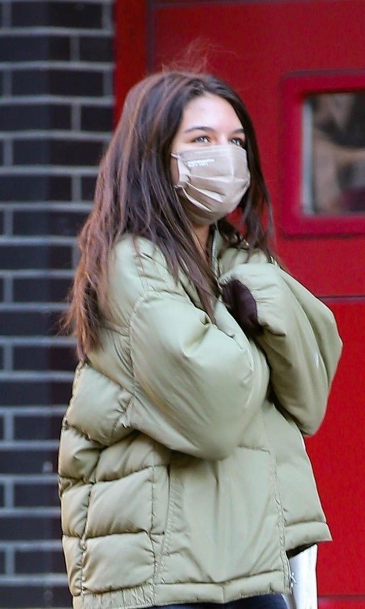 Suri Cruise is spotted walking alone in New York City.