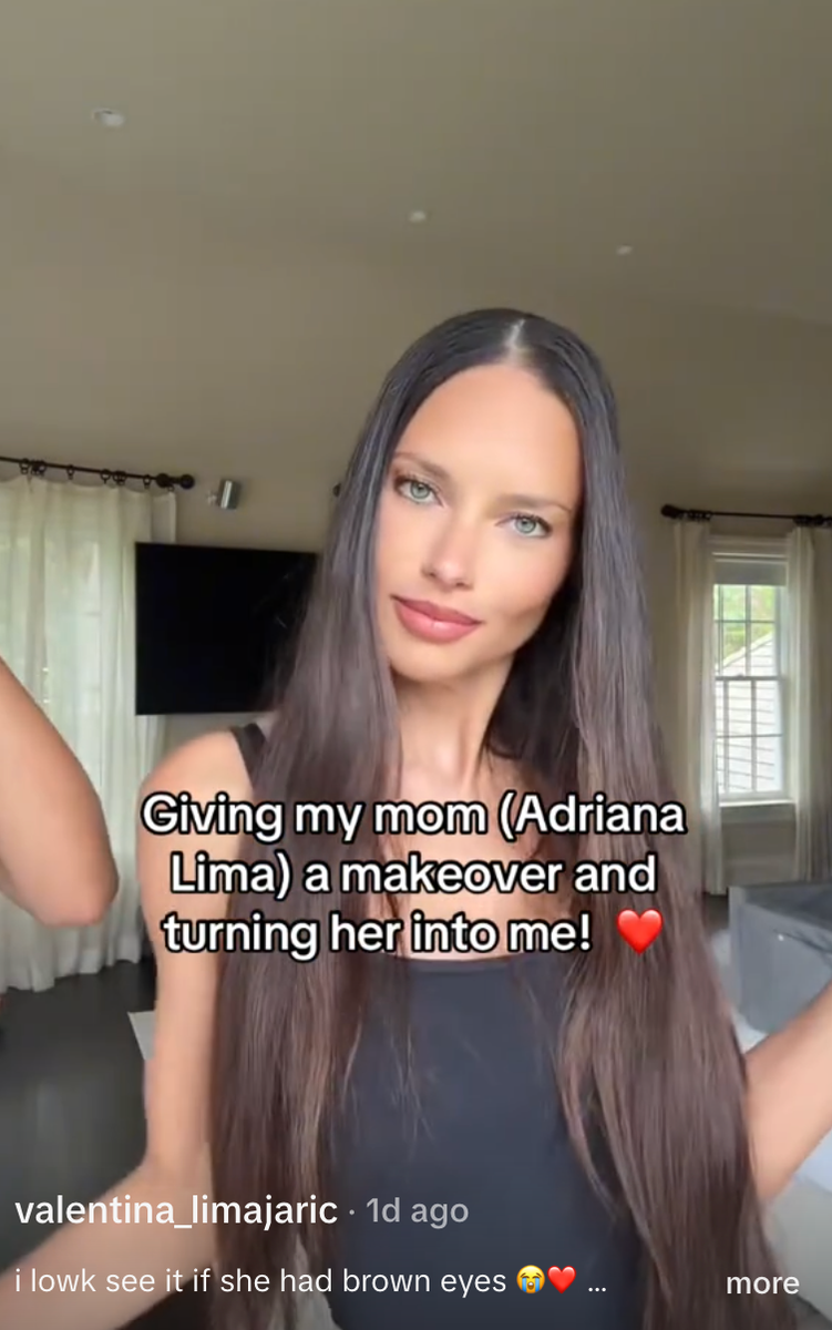 Adriana Lima debuts her daughter-inspired makeover, complete with sleek center-parted hair, soft glam makeup, and a fitted black tank.