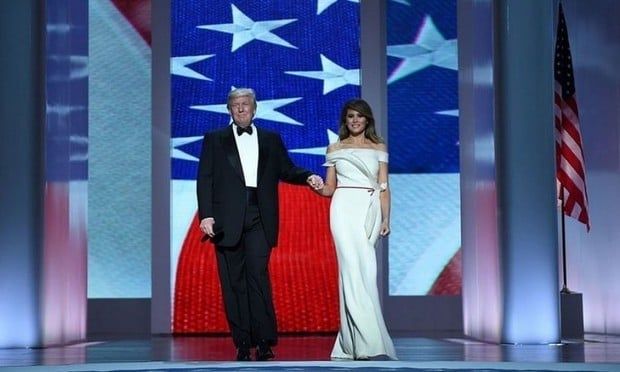 Melania wore a custom-made white gown by Herve Pierre. The organza number featured a high-leg split and stunning ruffled detailing, all topped off with a thin red belt and tiny bow.
The First Lady apparently had a hand in designing the dress with Herve Pierre, who is the former creative director of Carolina Herrera.
Photo: Getty Images