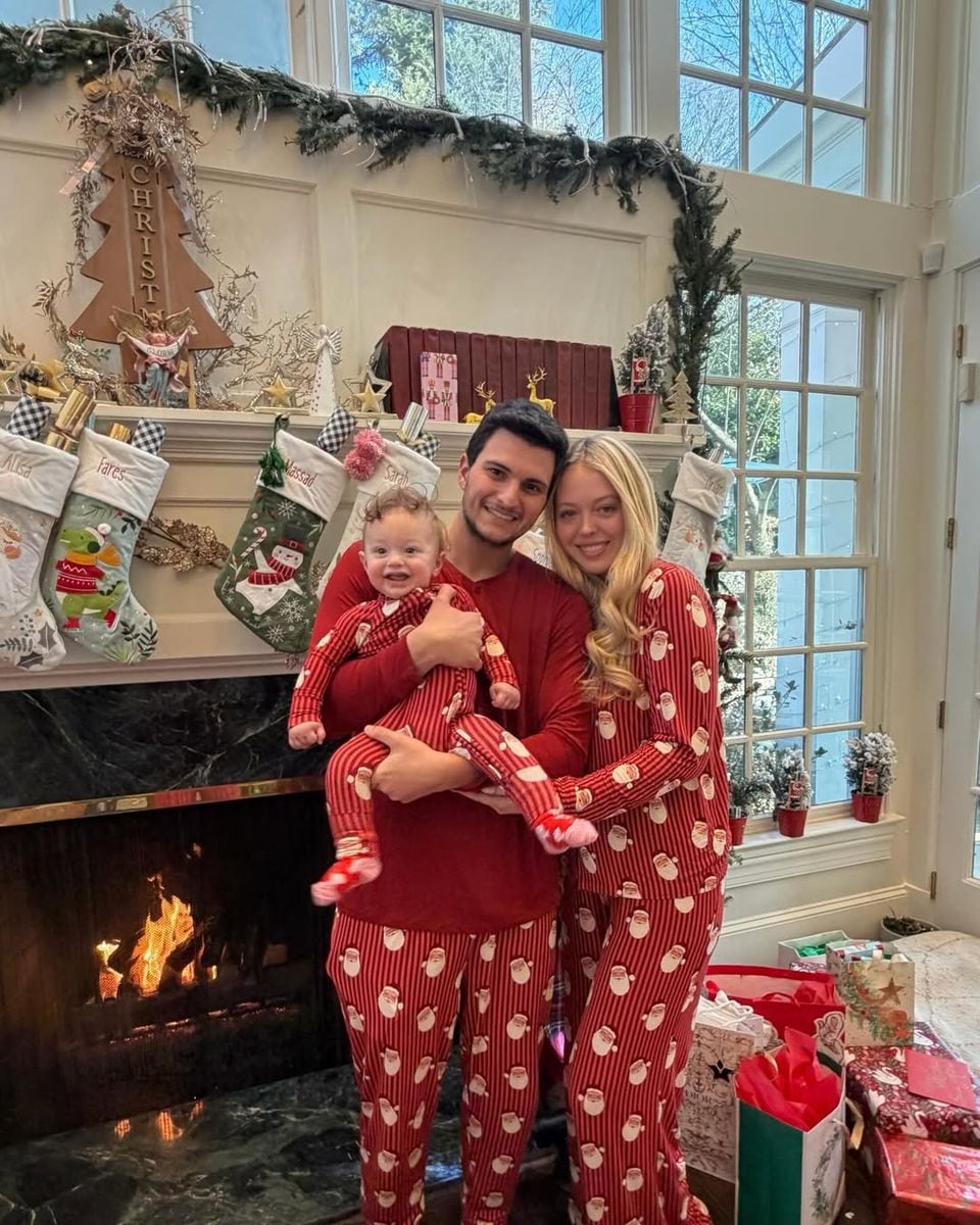 For Christmas morning, Tiffany, Alexander, and Michael wore matching Santa Claus pajamas