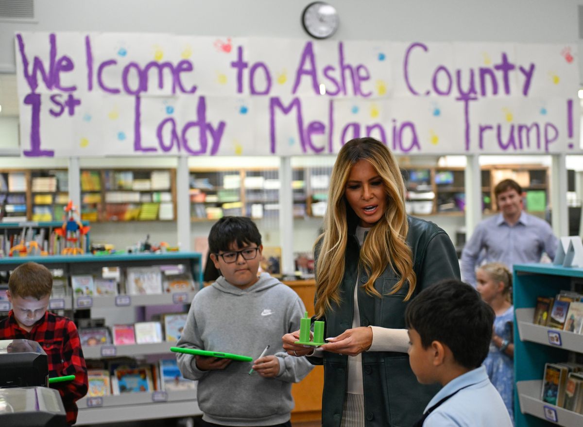 Melania interacted with students as they explored chatbots, 3D printing and robotics during her visit to the school's media center.