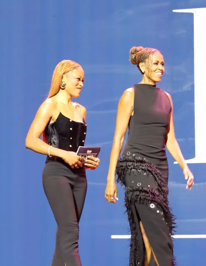 The sleeveless fringe gown first debuted as the opening look of Proenza Schouler's Fall 2026 runway collection under creative director Rachel Scott before Michelle Obama wore her own customized version.