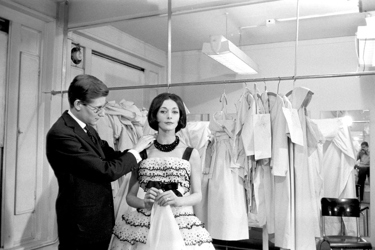 Kouka working alongside Yves Saint Laurent