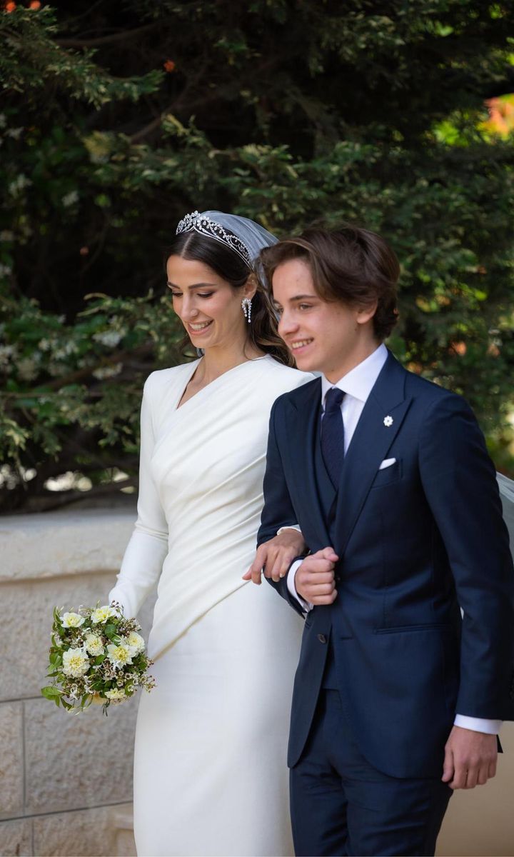 Rajwa walked down the aisle with the Crown Prince's younger brother, Prince Hashem.