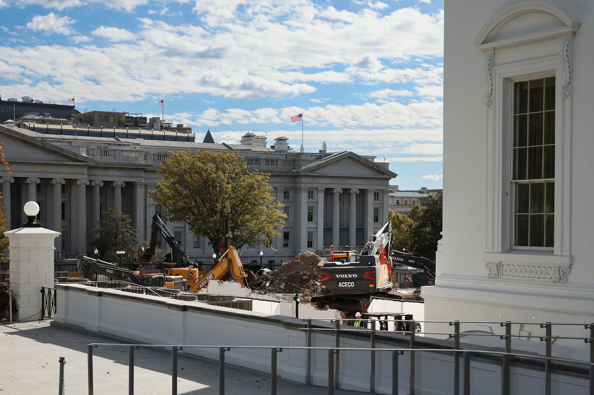 Excavators work to clear debris after the East Wing of the White House was demolished 