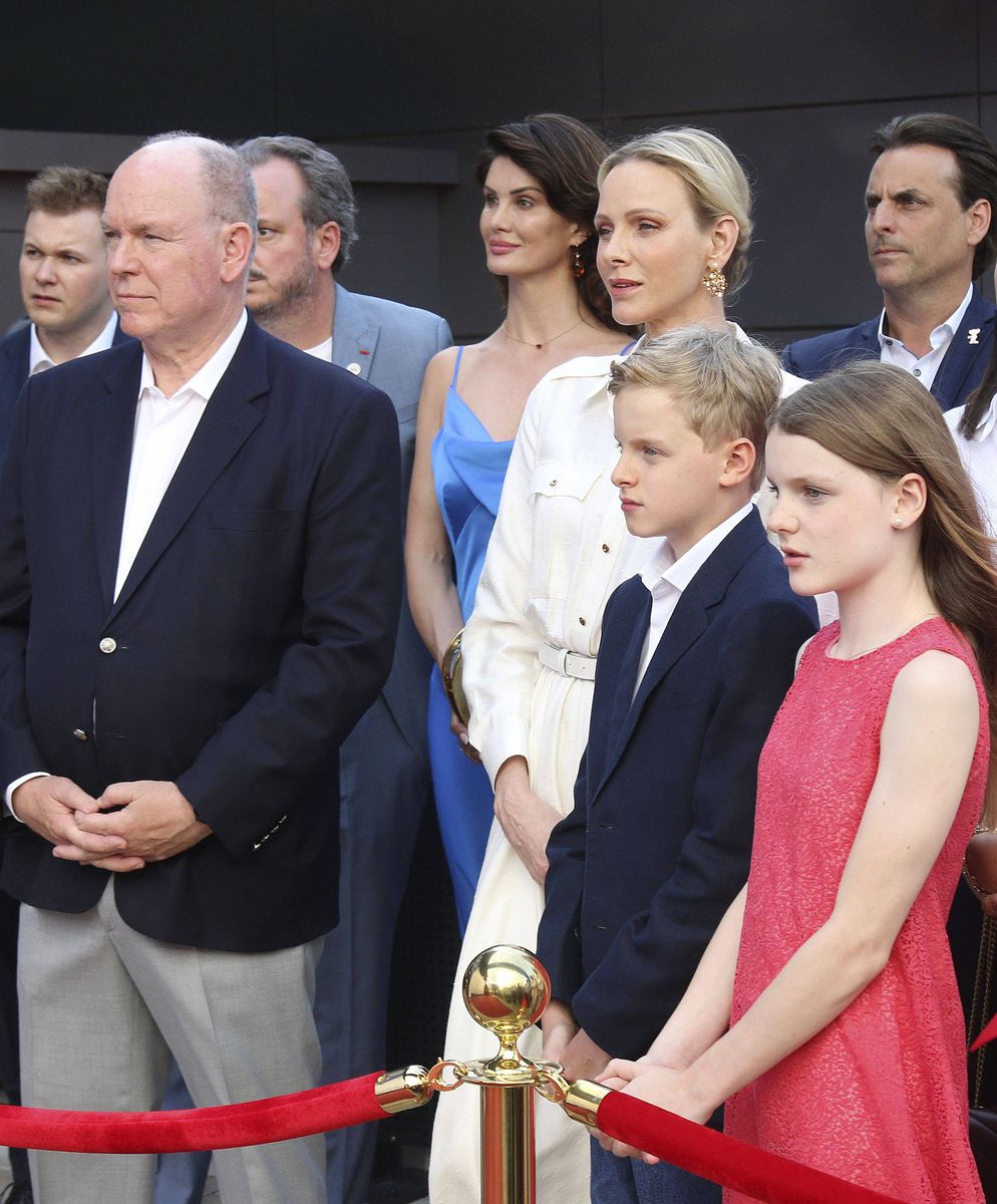 Princess Gabriella stole the spotlight in a vibrant coral-red dress as she joined Princess Charlene for the ribbon-cutting ceremony.