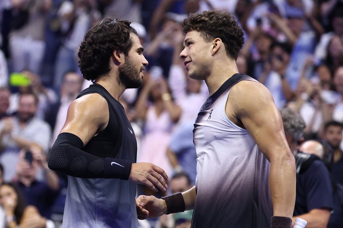 Ben Shelton and Carlos Alcaraz shaking hands on day ten of the US Open