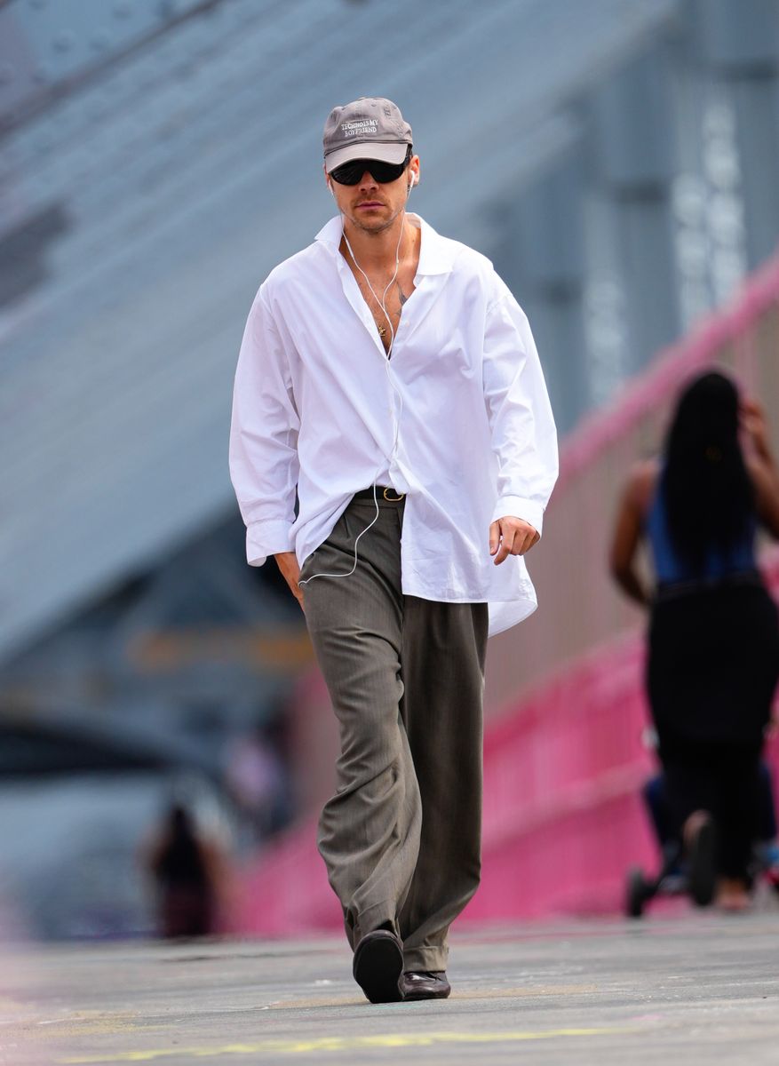 Harry Styles Makes the Oversized White Shirt the Menswear Look of Summer