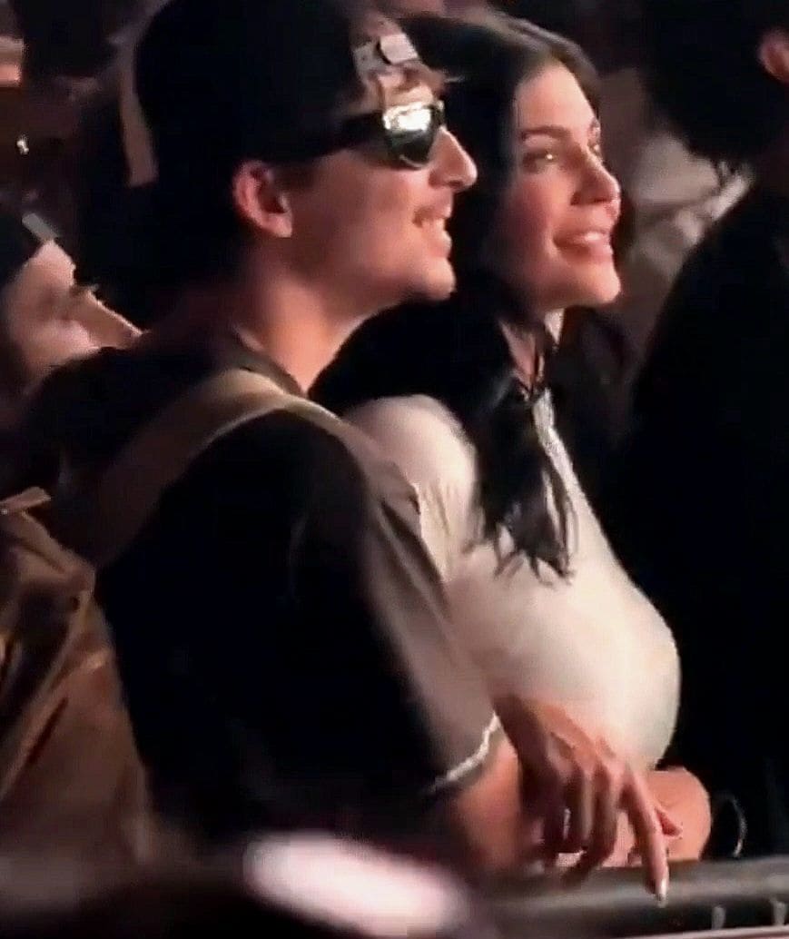 Kylie Jenner and her boyfriend Timothee Chalamet were spotted getting cozy in the crowd during Charli XCX's set at Coachella Weekend 1 in Indio, California.