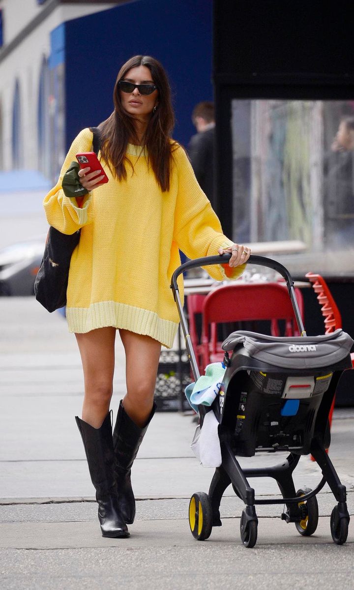 Emily Ratajkowski Rocks a Bright Yellow Sweater Dress and Cowboy Boots in NYC