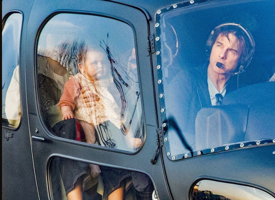 Tom Cruise takes flight—this time with a baby in tow